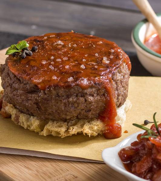 KETCHUP GLAZED BEEF BURGER WITH TOMATO CARAMELIZED ONIONS