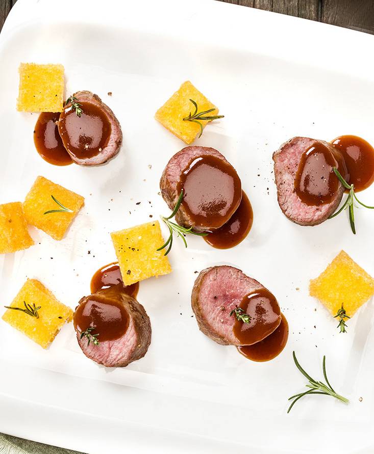 Lombatina di agnello, polentina fritta e ristretto al pomodoro